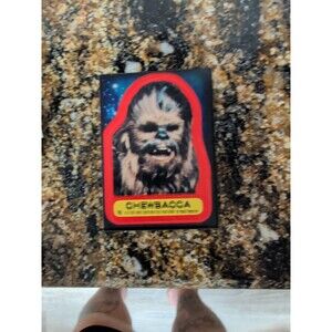 1977 TOPPS STAR WARS STICKER #016 RED SERIES Chewbacca Misprint DBL LETTERING